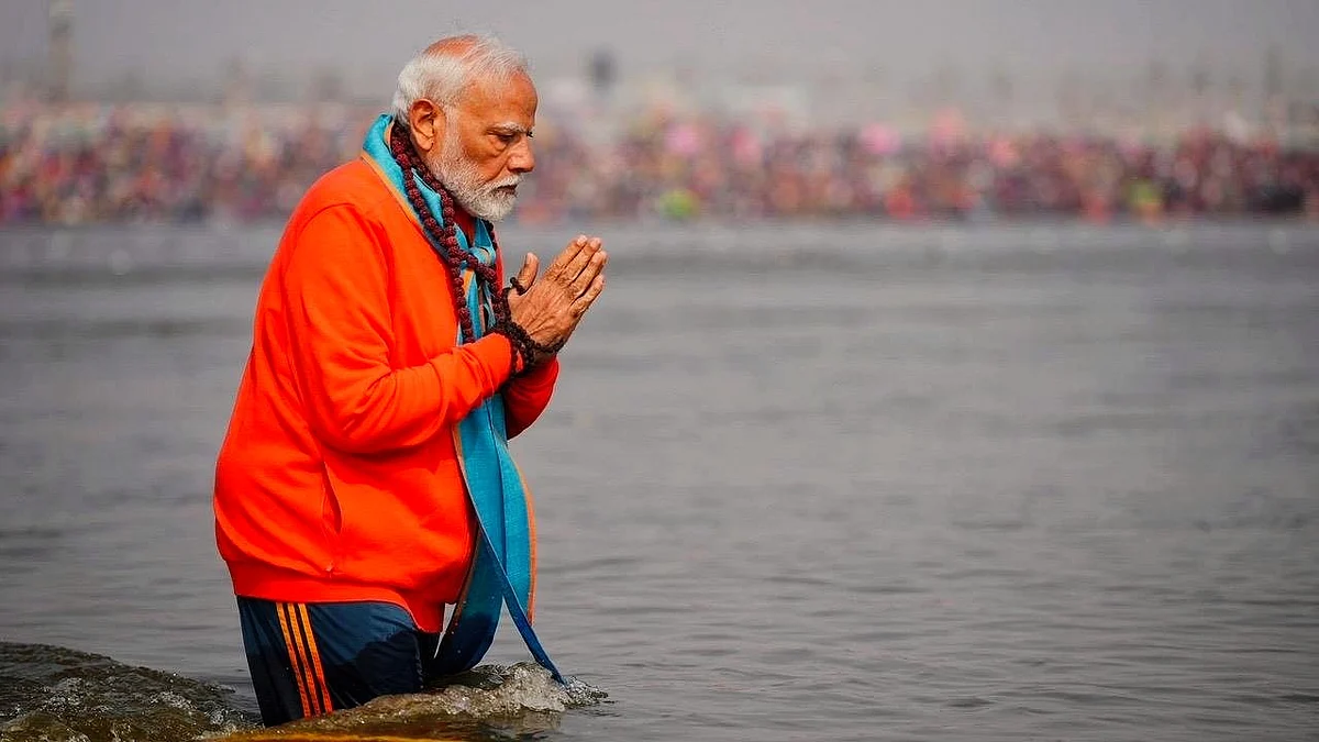 PM Modi stays well-wrapped against contamination for his Maha Kumbh dip