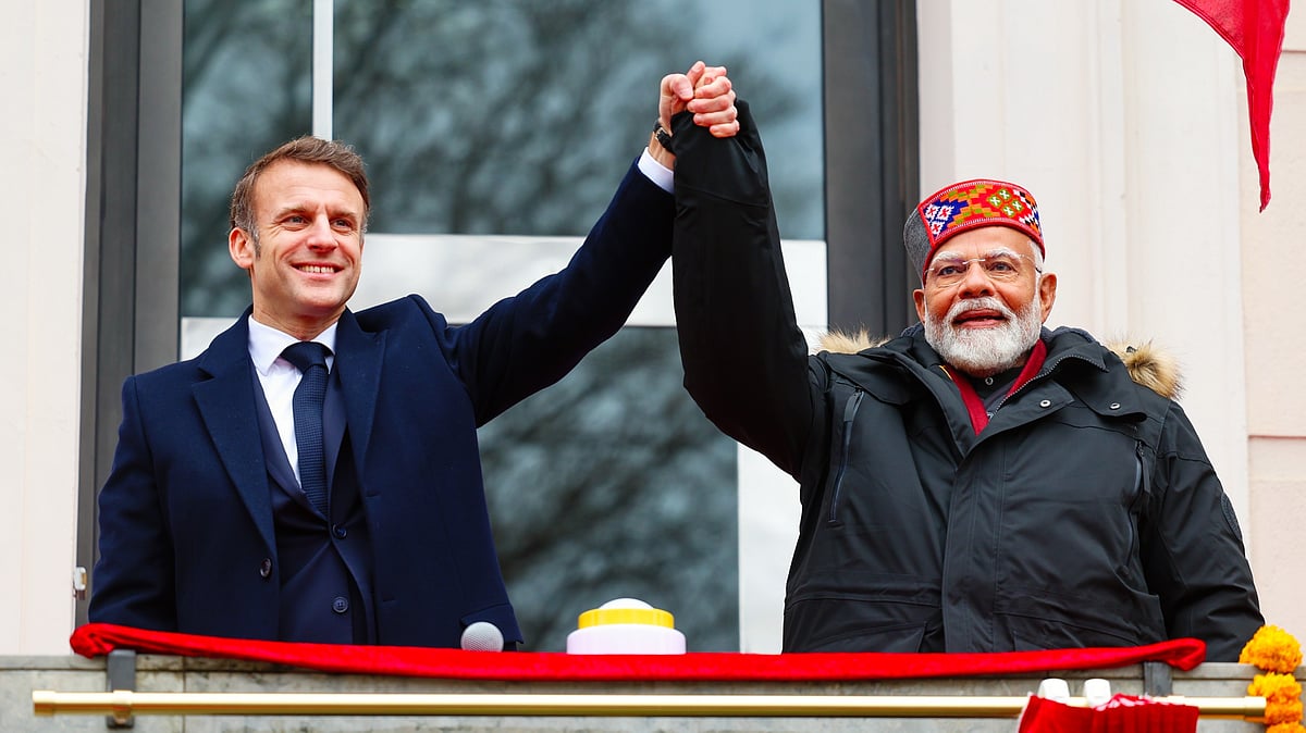 Macron-Modi resume official duties after handshake 'snub'