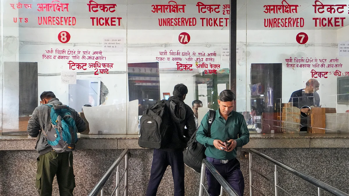 Passengers at ticket counters at New Delhi railway station on 17 February