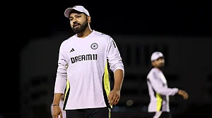 Rohit Sharma, who skipped the nets in Dubai, keeps an eye on the proceedings