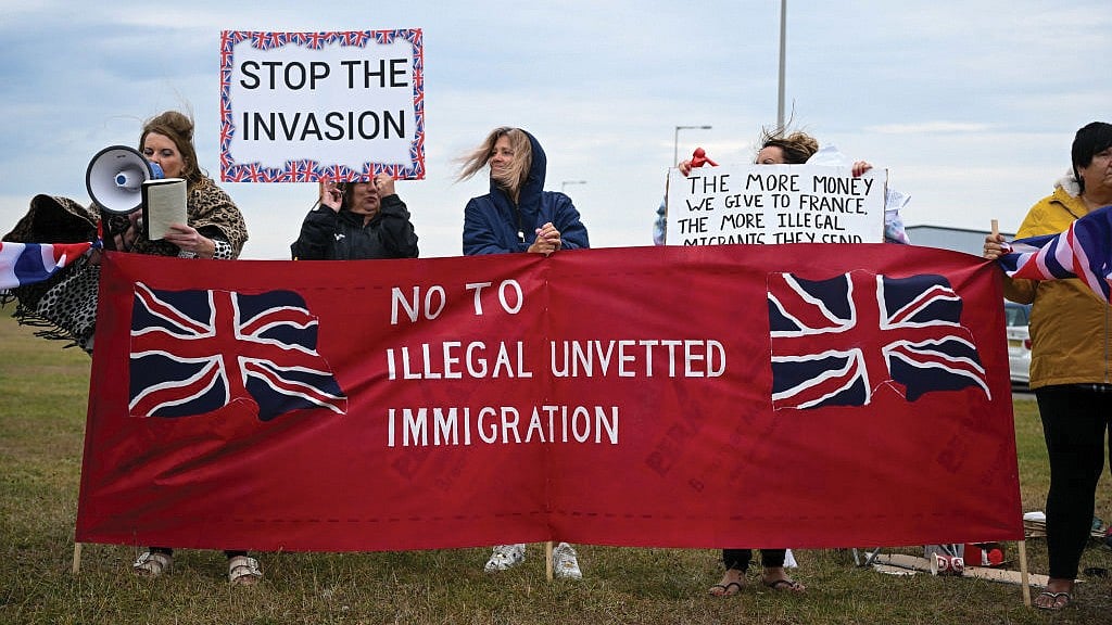 A protest against illegal immigration in Portland, England, September 2023 a question.’ 