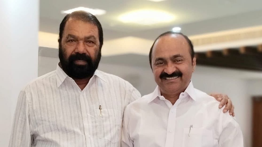 Kerala general education minister V. Sivankutty (left)