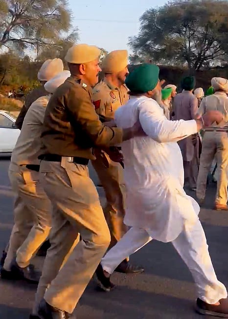 Farmers being detained during a protest in Mohali