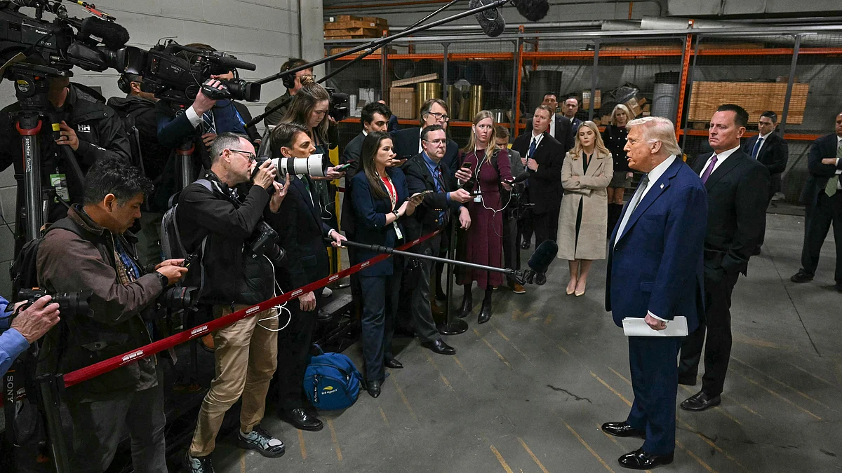Donald Trump talks to reporters in Washington on 17 March (photo: PTI)