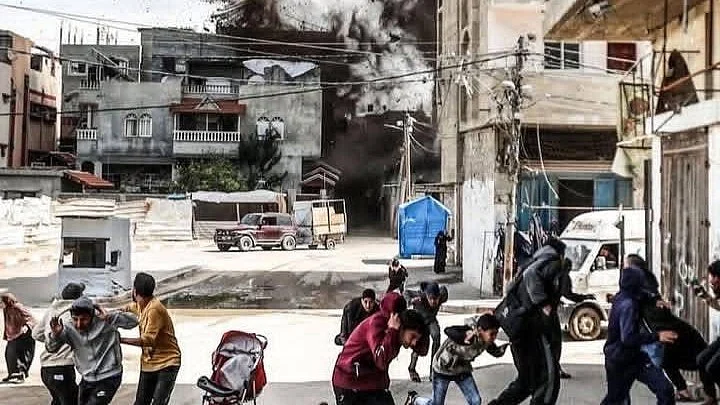 Families with children abandon strollers, duck and run as a strike hits a building in Gaza