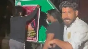 A signboard being vandalised in Lutyens' Delhi on 28 March (photo: @HateDetectors/X)