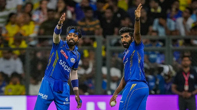 Jasprit Bumrah with MI captain Hardik Pandya