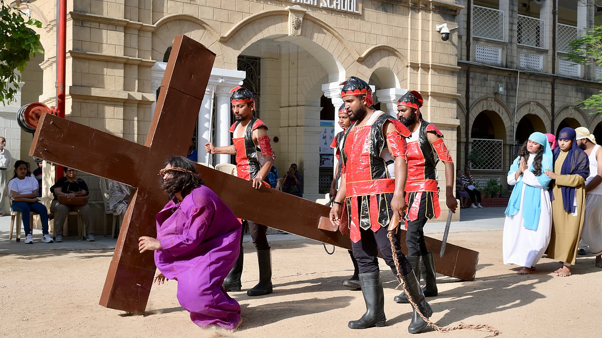 Students reenact the crucifixion of Jesus Christ at St. Xavier's High School in Ahmedabad (photo: PTI)