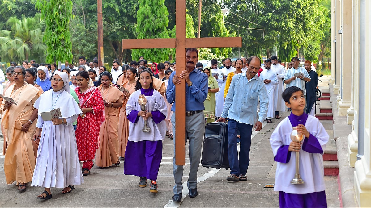 Christian community members take part in a procession in Prayagraj (photo: PTI)