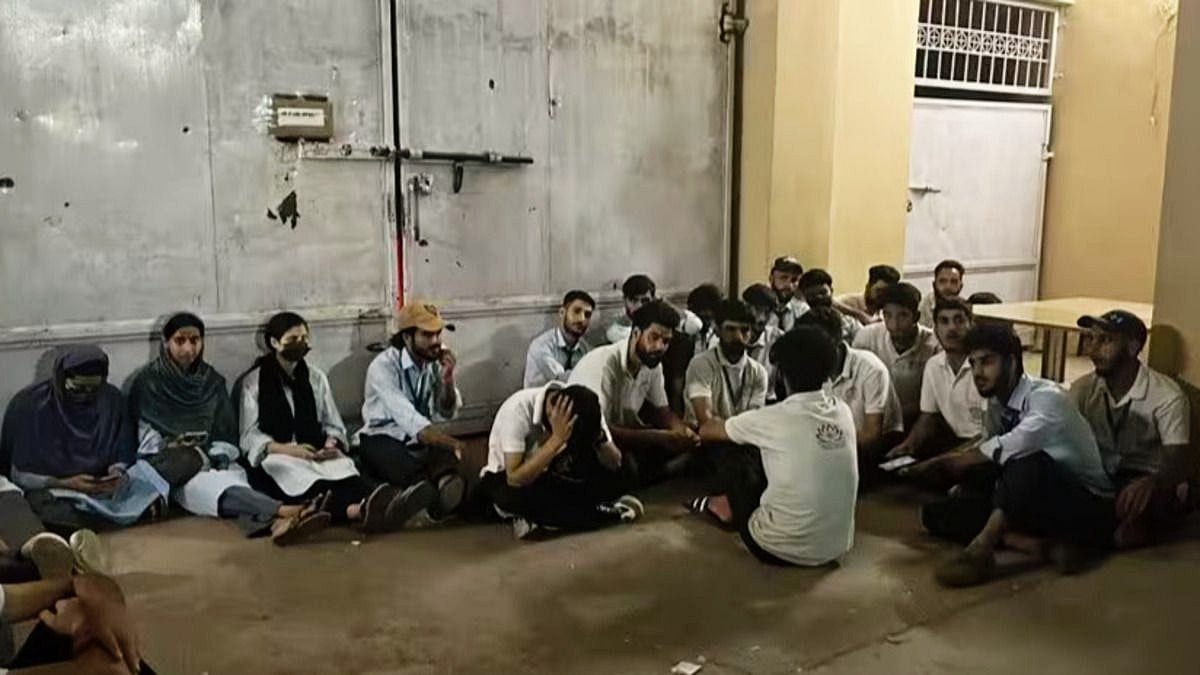Kashmiri students pushed out of hostels spend the night huddled together