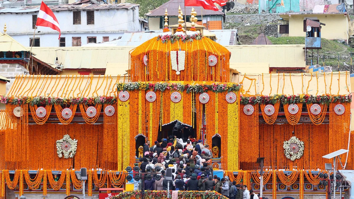People visit the Shri Badrinath Dham as its doors opened, in Chamoli district