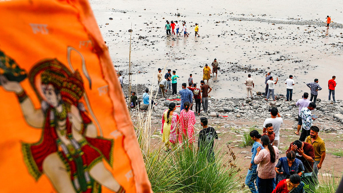 Curious locals on the Chenab (photo: PTI)