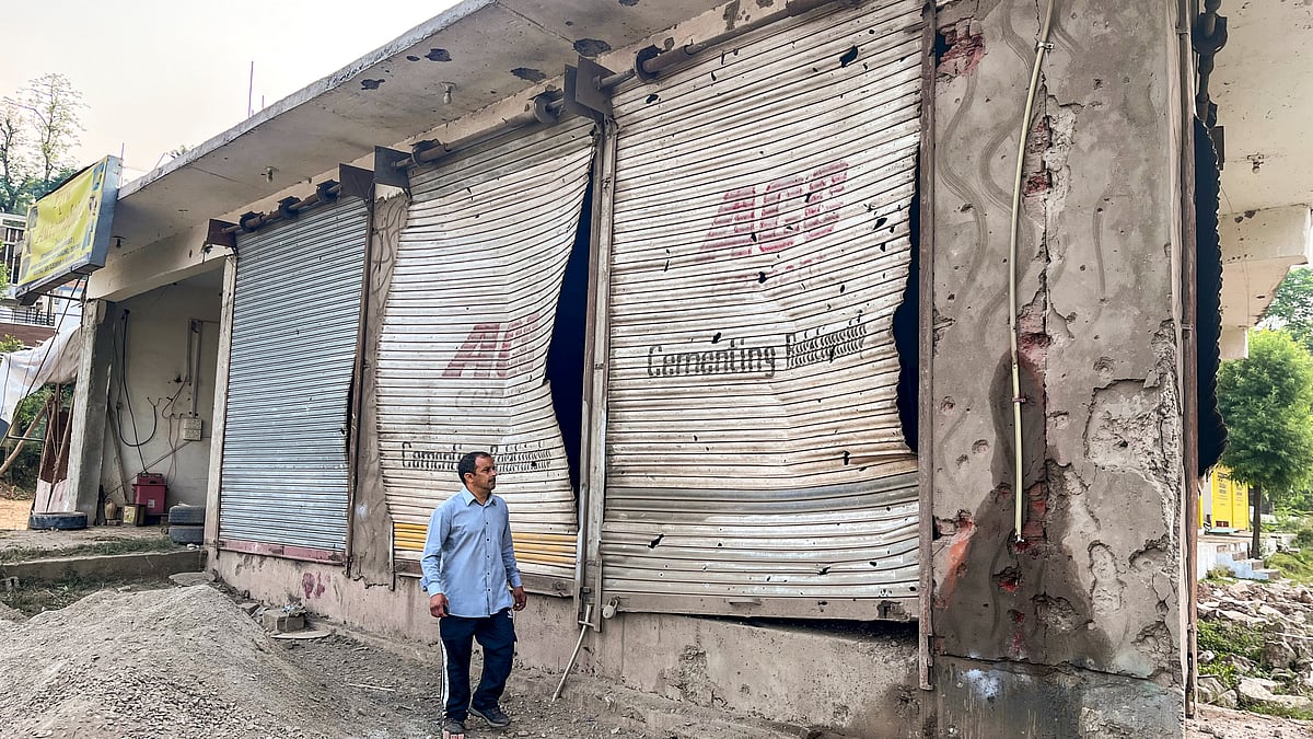 A row of damaged shops in Poonch