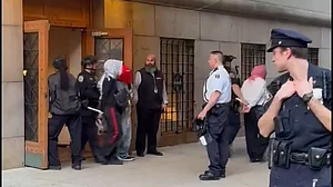 Pro-Palestinian demonstrators clash with security guards at Columbia University