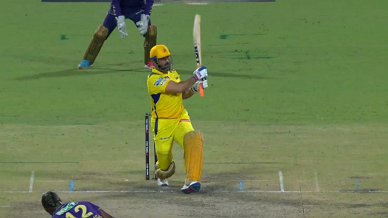 Take that: Dhoni bludgeons Andre Russell for a six on 7 May (photo: BCCI)