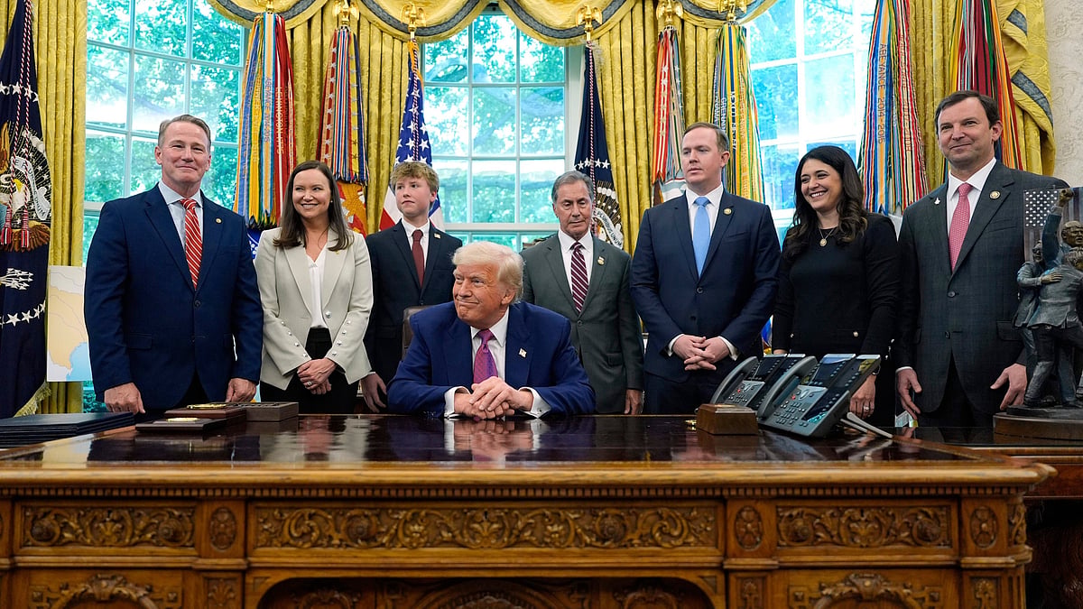 Donald Trump speaks with reporters at White House on 9 May (photo: AP/PTI)