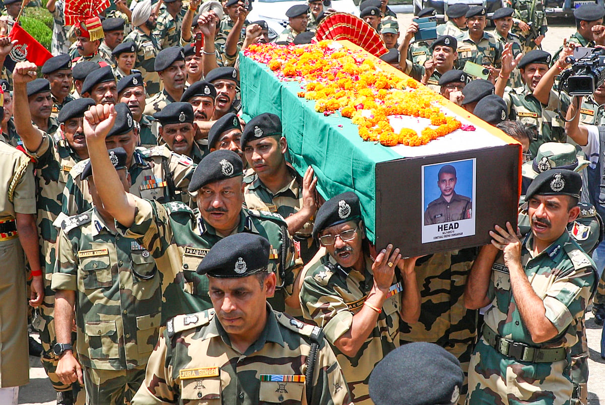 BSF personnel lay to rest BSF constable Deepak Chingakham, who was martyred in the line of duty in Jammu