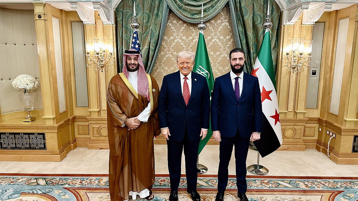 Trump meets Syria's al-Qaeda fighter-turned-leader, lifts sanctions in surprise move