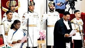 President Droupadi Murmu giving oath of office to Chief Justice BR Gavai.