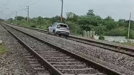 Woman drives car on railway track in Telangana, disrupts train services