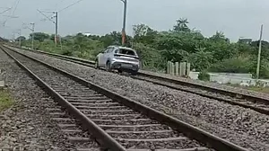 Woman drives car on railway track in Telangana, disrupts train services