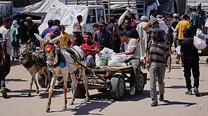 Medics say 22 Palestinians killed in Israeli fire on crowds at Gaza aid sites
