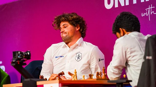 Magnus Carlsen looks frustrated after resigning against D. Gukesh (photo: @GrandChessTour/X)