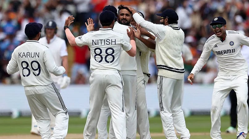 Akash Deep being joined by his teammates after claiming one of his six wickets