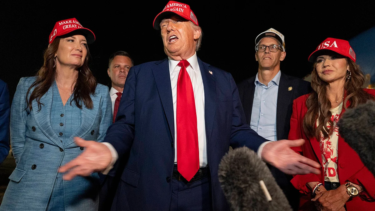 Donald Trump speaks with reporters at Joint Base Andrews on 4 July (photo: AP/PTI)