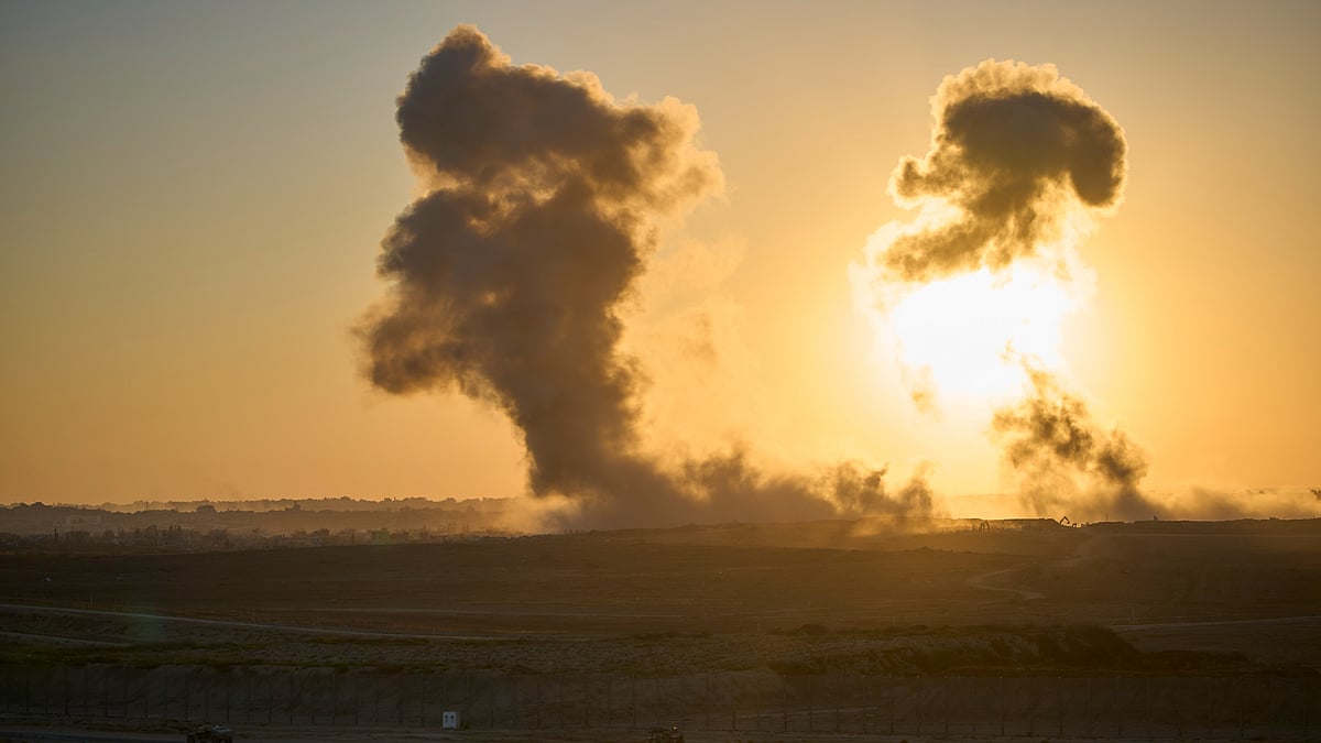 Smoke from an explosion rises in northern Gaza Strip on 6 July (photo: AP/PTI)