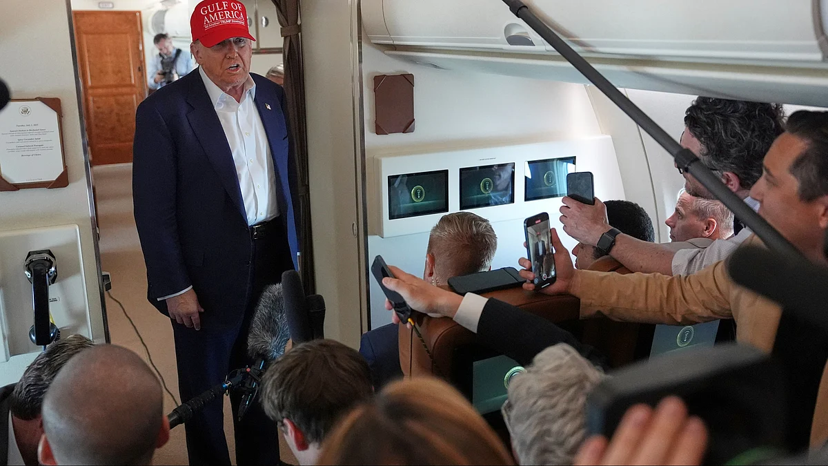 Donald Trump meets reporters on Air Force One in Florida on 1 July (photo: AP/PTI)