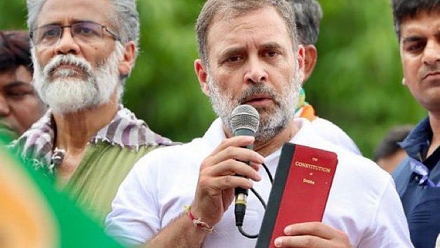CPI(M-L) Liberation’s Dipankar Bhattacharya and Congress Rahul Gandhi at a rally in Bihar