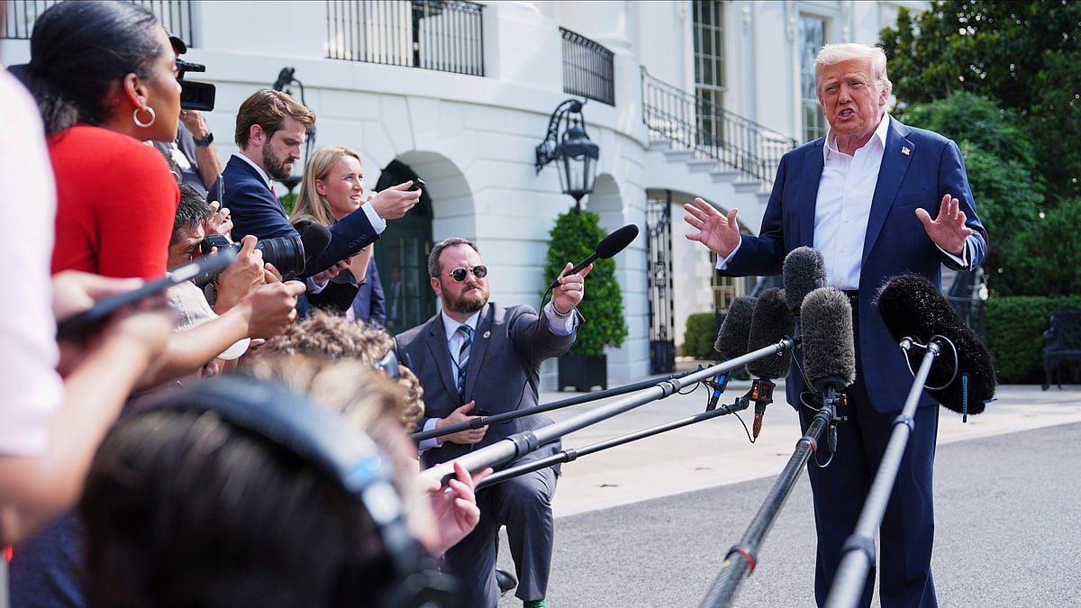 Donald Trump speaks with reporters at White House on 11 July (photo: AP/PTI)