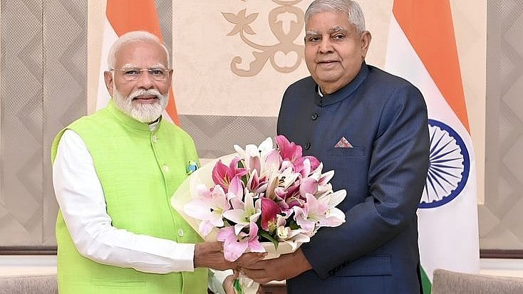 In healthier times: PM Narendra Modi and then-Vice-President Jagdeep Dhankhar