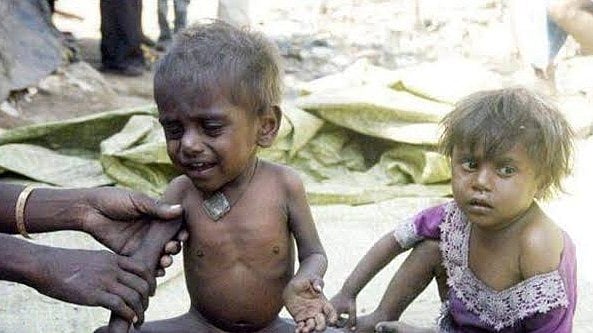 Why can't Mother India feed all her children, when we have enough to even export