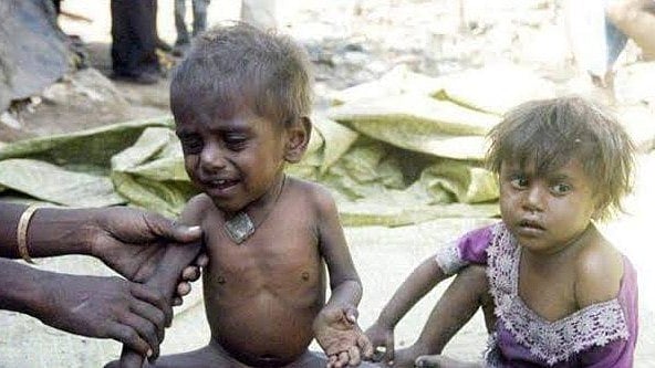 Why can't Mother India feed all her children, when we have enough to even export