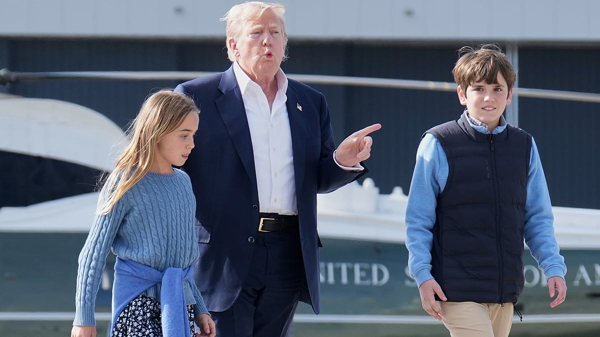 Donald Trump walks with his grandchildren at RAF Lossiemouth on 29 July (photo: AP/PTI)