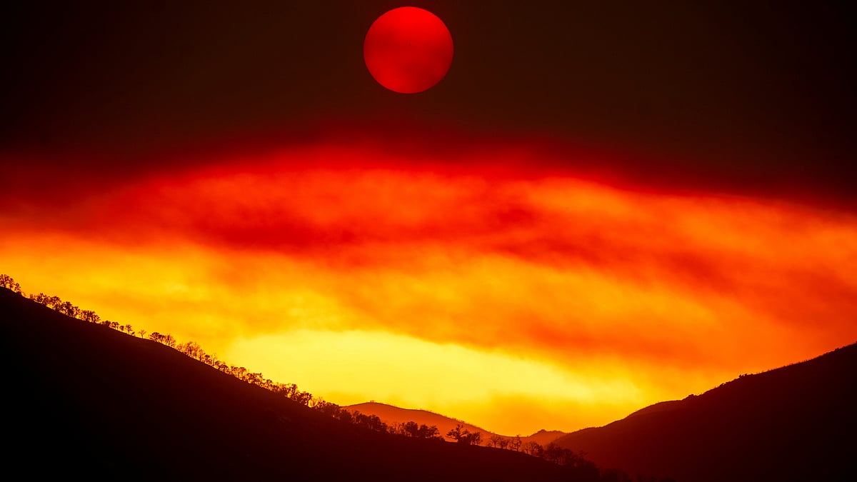 Smoke from Gifford Fire fills the sky as sun sets over Los Padres National Forest on 4 August (AP/PTI)