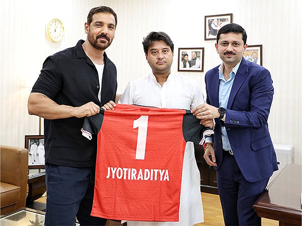 John Abraham with Jyotiraditya Scindia and NUFC CEO Mandar Tamhane