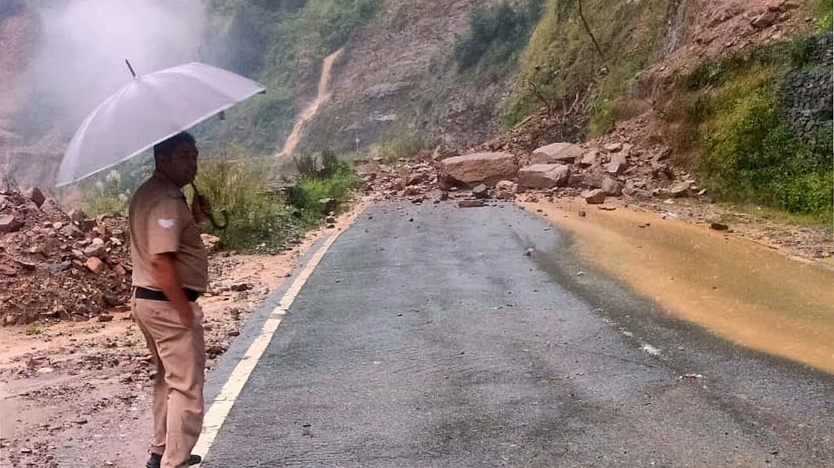 A road blocked by debris after heavy rainfall in Rudraprayag. (photo: PTI)