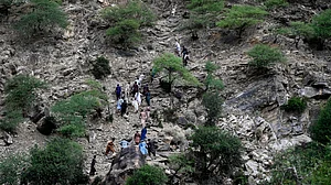 villagers rush to assist survivors in quake-ravaged Nurgol, Kunar