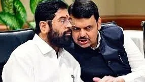 Maharashtra CM Devendra Fadnavis (R) with deputy CM Eknath Shinde 