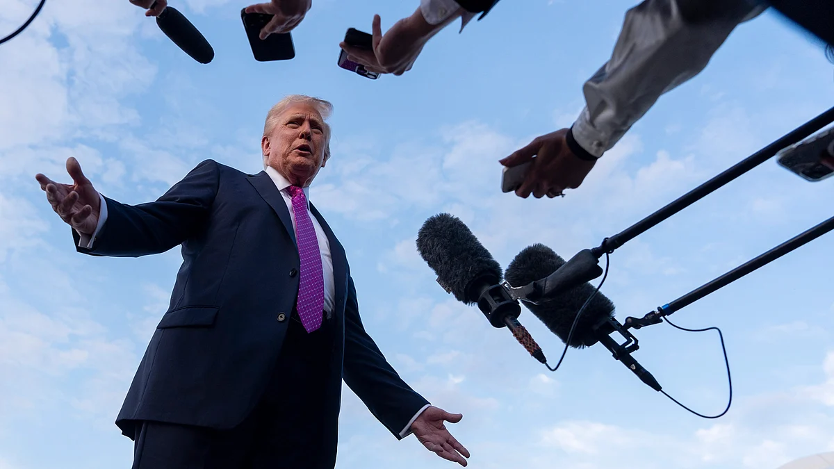 President Trump addresses reporters before departing on Air Force One.