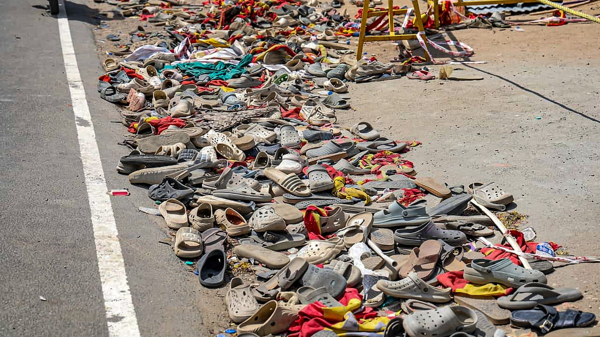 Karur aftermath: Footwear and other belongings gathered by the roadside 