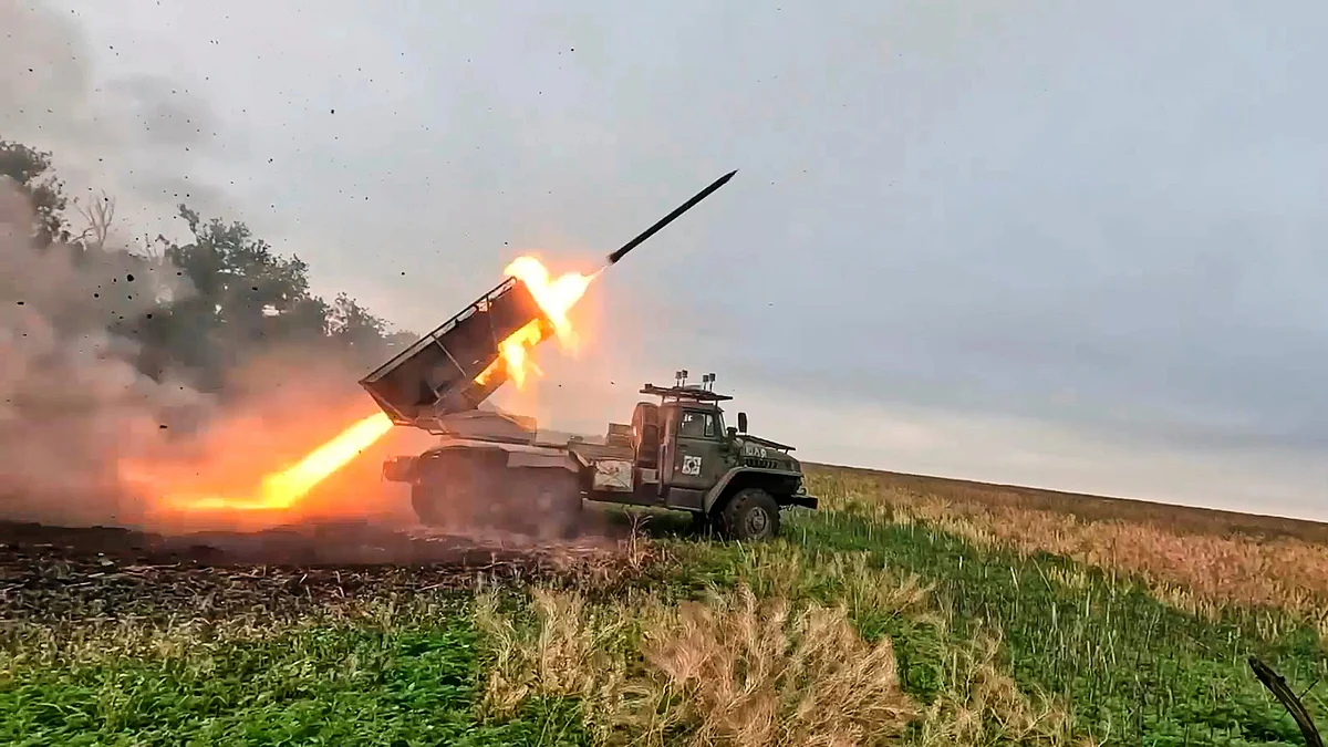 Russian "Grad" self-propelled 122 mm multiple rocket launcher fires towards Ukrainian positions 