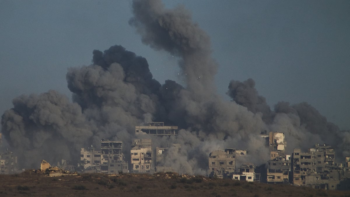 Smoke rises over the Gaza Strip after an Israeli airstrike on 5 October.