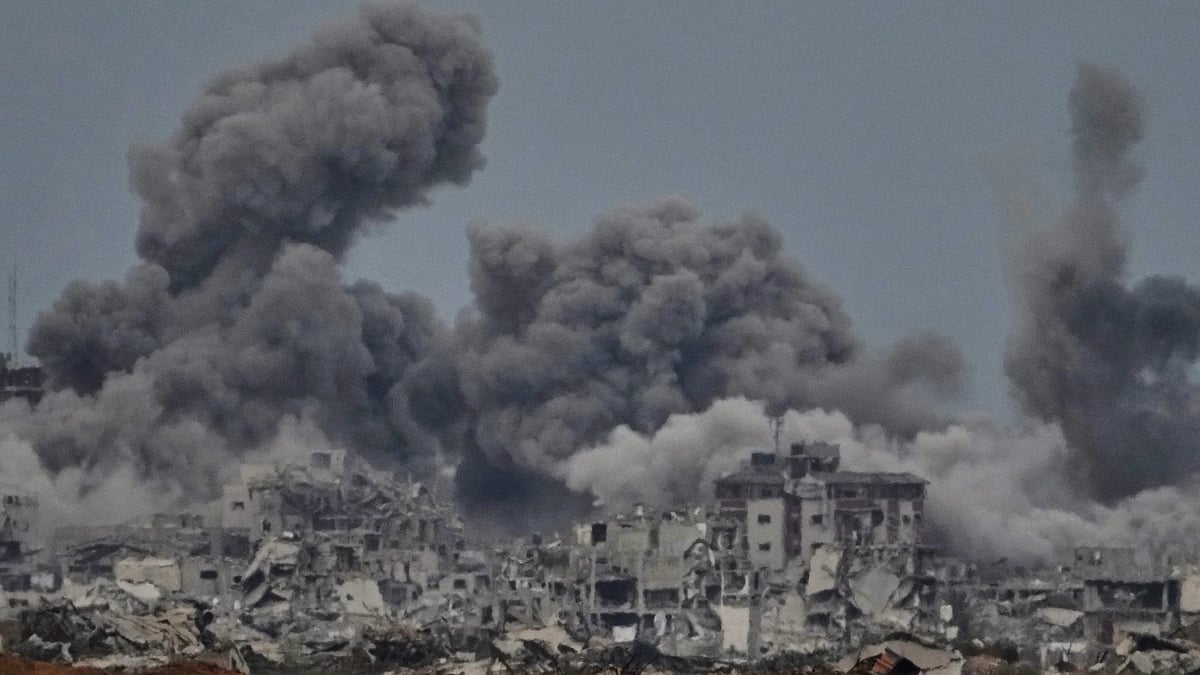 Smoke rises from an Israeli strike in Gaza, hours before the formal ceasefire announcement