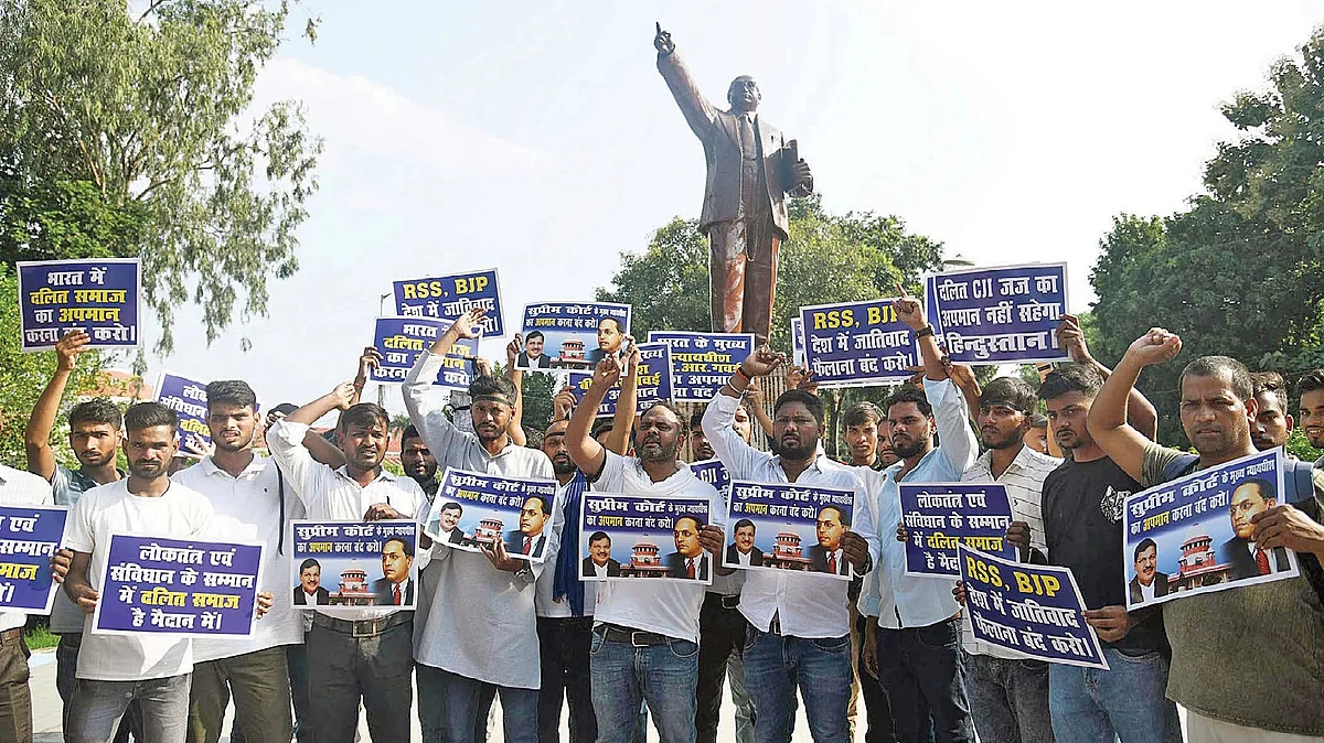 Protest against anti-Dalit atrocities around Ambedkar statue on behalf of CJI B.R. Gavai