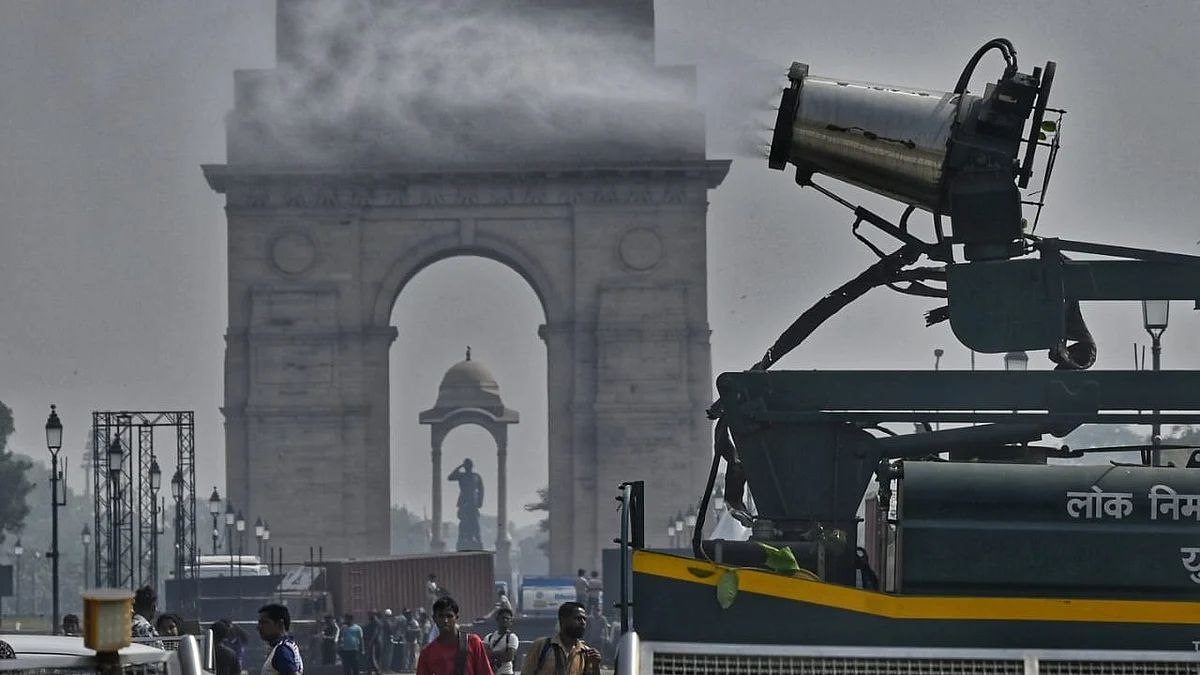 File photo of a smog gun in action at India Gate 