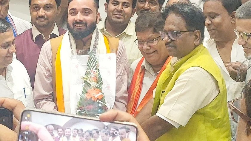 Anil Sahani (far right) with party colleagues in Aug 2025